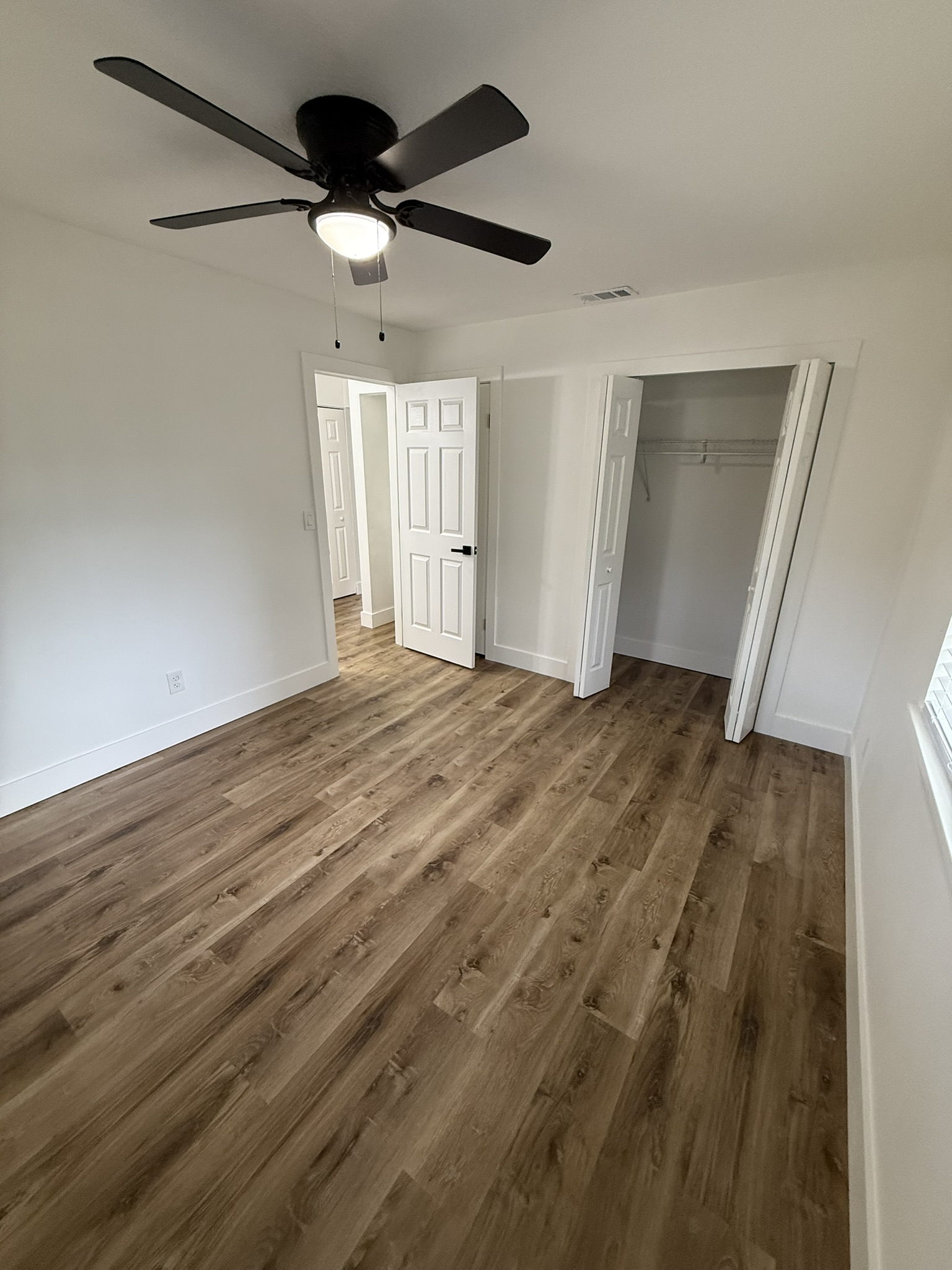 Bedroom with new doors and trim